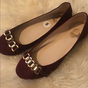 Burgundy ballet flats with gold chain detail